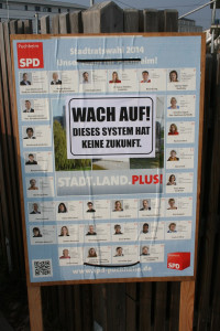 Überklebtes SPD-Plakat